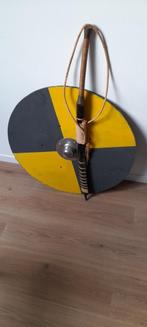 vikingschild en afrikaans zwaard, Enlèvement