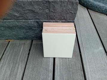 Set tegels van 15 cm x 15 cm beschikbaar voor biedingen