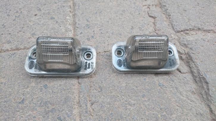 Plastique hella éclaire plaque golf 3, Auto-onderdelen, Verlichting, Volkswagen, Gebruikt, Ophalen of Verzenden