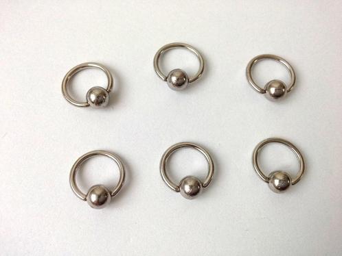 6 anneaux pour piercings en acier chirurgical 0.8 x 10 mm, Handtassen en Accessoires, Piercings, Gebruikt, Staal, Ophalen of Verzenden