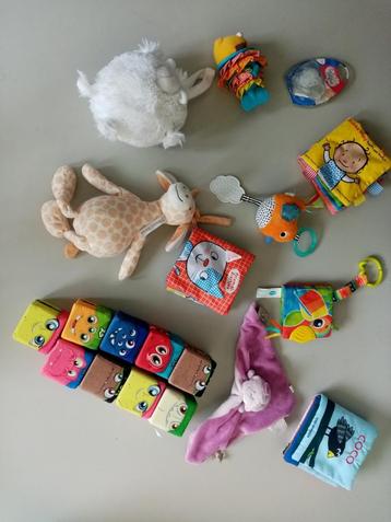 Pakket met verschillende merk babyspeelgoed