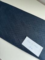 Stuk stof donkerblauw, Ophalen