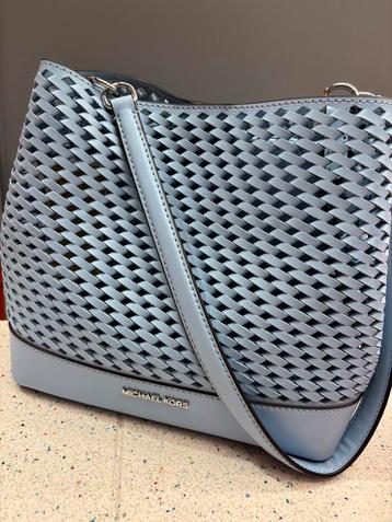Michael Kors: prachtige babyblauwe handtas beschikbaar voor biedingen
