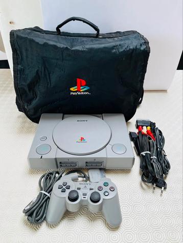 Console PS1 dans un sac+manette+jeux+carte mémoire 