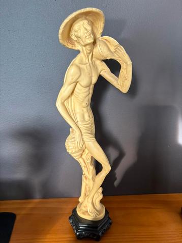 Aziatisch beeldje beschikbaar voor biedingen