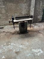 Kantenschuur machine, Ophalen