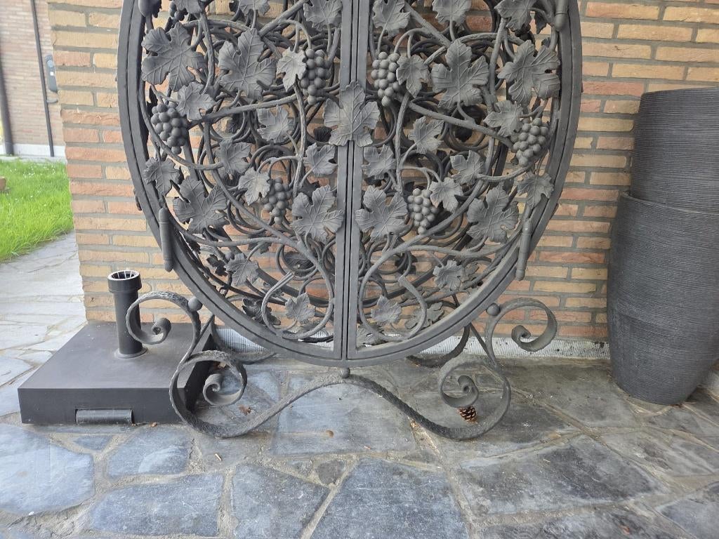 smeedijzeren wijnrek, Ophalen