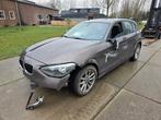 Koplamp links van een BMW 1-Serie, Ophalen of Verzenden, 3 maanden garantie, Gebruikt, BMW