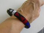 Handgemaakte uniseks armband met Afrikaanse kralen., Handtassen en Accessoires, Armbanden, Ophalen of Verzenden, Leer