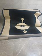 2 meter op 3 twee stukken tapijten, Ophalen