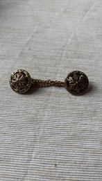 Fermeture à 2 boutons, Enlèvement