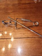 Set voor escargot, Ophalen