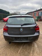 BMW 1 SERIE✅ 116iA AUTOMAAT OPEN DAK GARANTIE CARPLAY, Auto's, Euro 5, Zwart, 5 deurs, Velours
