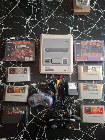 Super Nintendo-console + 8 games + 2 controllers enz.   beschikbaar voor biedingen
