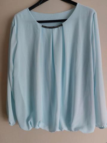 Lichtblauwe blouse maat L