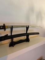 Katana japonais noir, Enlèvement