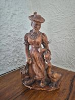 Handgesneden houten beeld van vrouw met gans, Ophalen