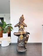 Groot massief bronzen beeld, Ophalen