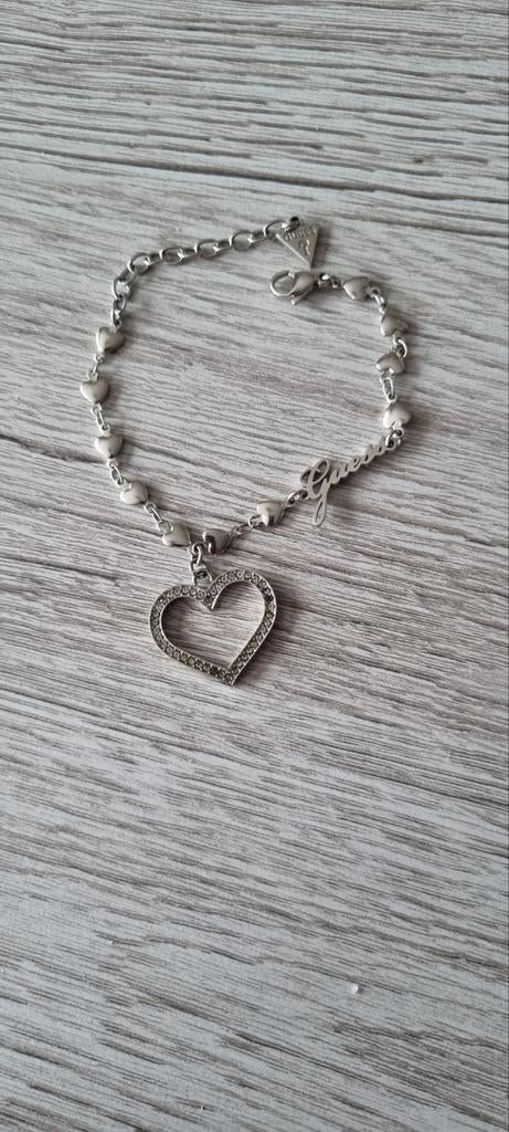 Armband met hart van guess, Ophalen