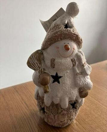 Sneeuwmanbeeldje beschikbaar voor biedingen