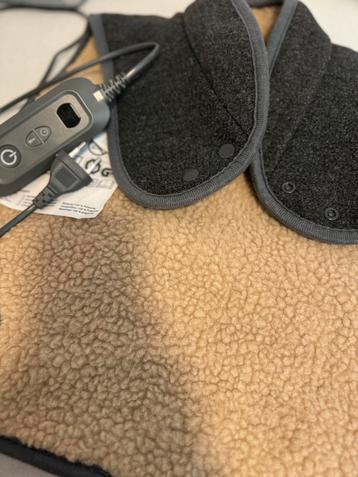 Nek-schouderwarmtekussen beschikbaar voor biedingen