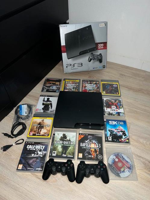 playstation 3 slim 320gb met accessoires + doos, Games en Spelcomputers, Spelcomputers | Sony PlayStation 3, Zo goed als nieuw