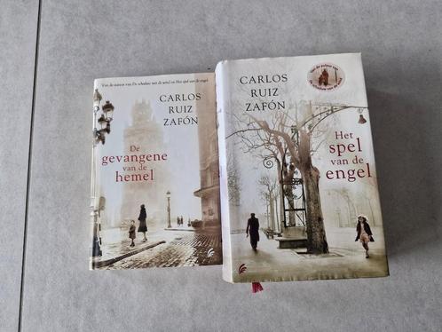 Het spel van de engel / De gevangene van de hemel €2/stuk, Boeken, Romans, Ophalen of Verzenden