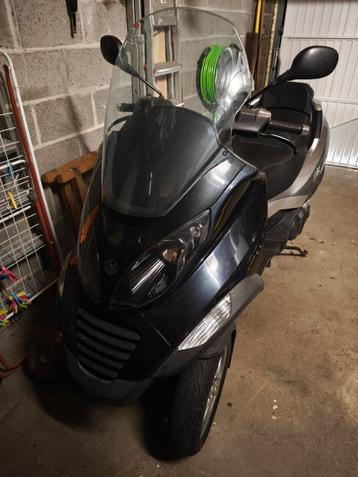 MP3 Piaggio 500cc. ( B ) disponible aux enchères