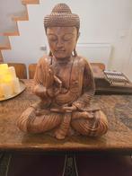 Vol houten zittende budha beeld, Enlèvement