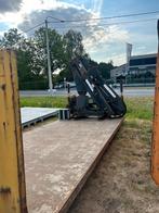 Containerplateau met kraan, Ophalen