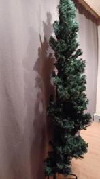 Plaatsbesparende halve kerstboom, Ophalen