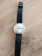 À vendre Omega Genève automatique en or 18 carats, Handtassen en Accessoires, Horloges | Dames, Ophalen of Verzenden, Zo goed als nieuw