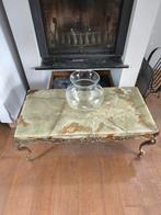 Une table d'appoint marbré, Ophalen