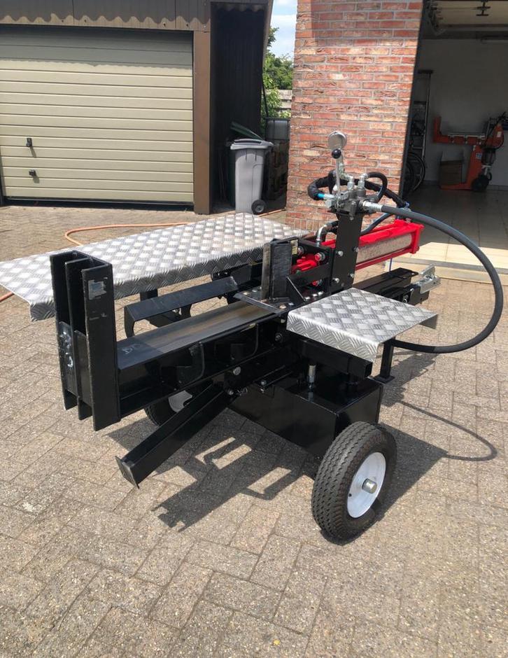 Houtkliever 22 ton TE HUUR!!, Tuin en Terras, Brandhout, Stammen, Ophalen of Verzenden