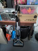 Stofzuigel en dweil in een bisell, Ophalen