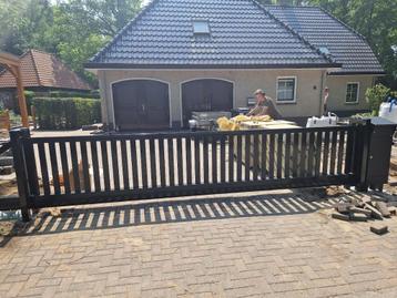 Lamellen houtlook schuifpoort of draaipoort incl montage beschikbaar voor biedingen