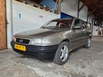 Opel Astra F 1.4 8V 3drs 1995 rookzilver 171700km, Voorwielaandrijving, 4 cilinders, Grijs, Particulier