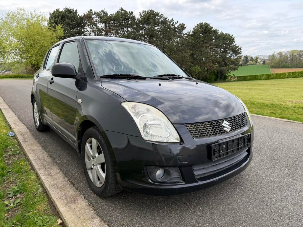 Suzuki Swift 1.3i - 73.000km - 5 deurs - Airco - Onderhouden, Auto's, Suzuki, 1328 cc, Bedrijf, Euro 4, Onderhoudsboekje