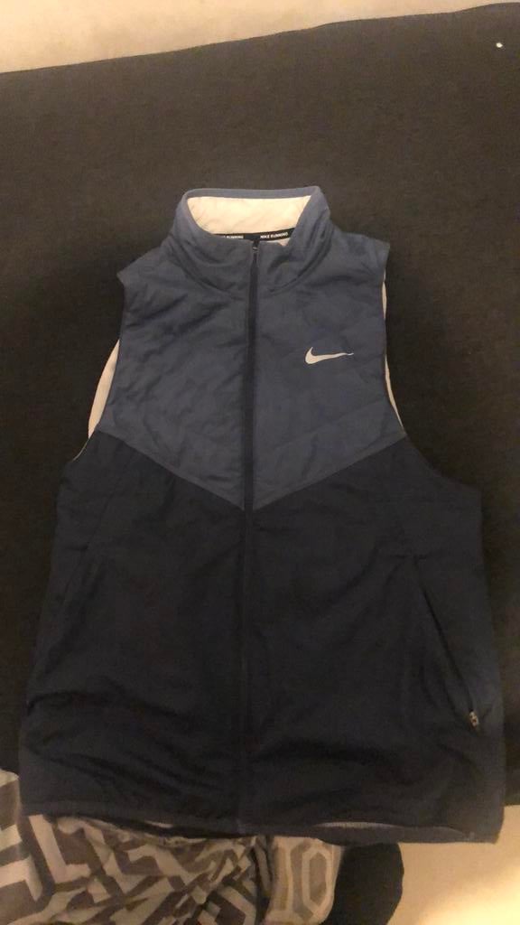 blauwe nike bodywarmer te koop, Kleding | Heren, Bodywarmers, Ophalen of Verzenden, Gedragen, Maat 46 (S) of kleiner, Blauw