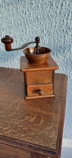 Oude koffiemolen, Ophalen