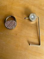 Handtashangers, Ophalen, Zo goed als nieuw