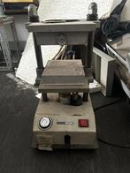 Goudsmid vulkaniseer pers, Ophalen