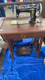 Naaimachine (Verviers), Ophalen