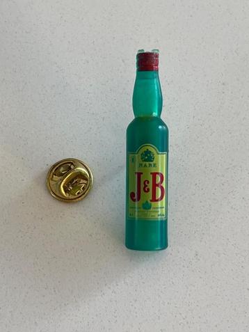 Vintage pin J&B beschikbaar voor biedingen