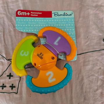 Rammelaar voor leeftijd van 6m + van merk "Bambino" beschikbaar voor biedingen