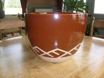 Stenen cache pot, Ophalen