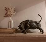 Kunstwerk Pierre Chenet - aanvallende stier, Ophalen