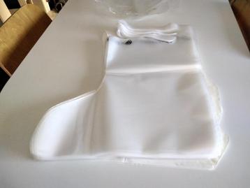 Set van 100 plastic schoenbeschermers voor eenmalig gebruik beschikbaar voor biedingen