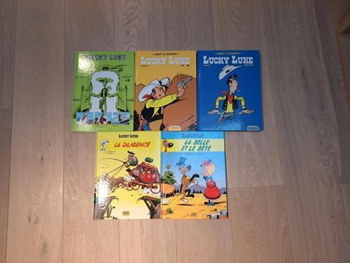 Lot : 1 BD Lucky Luke + 3 Intégrales + 1 BD Rantanplan, Boeken, Stripverhalen, Gelezen, Meerdere stripboeken, Ophalen