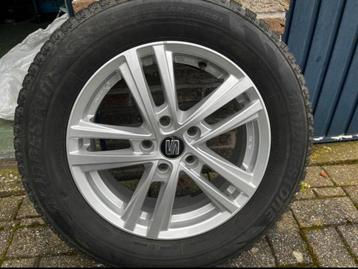 Winterband met velg beschikbaar voor biedingen